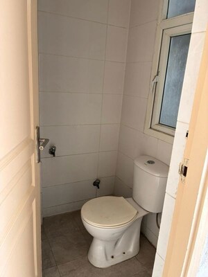 Bathroom in 1 RK Apartment at Mahindra Aura, Sector 110a – for Rent