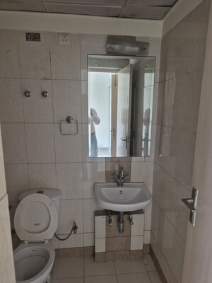 Bathroom in 1 RK Apartment at Mahindra Aura, Sector 110a – for Rent