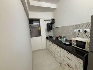 Kitchen in 1 BHK Apartment at Lodha Unica, Jogeshwari West – for Rent