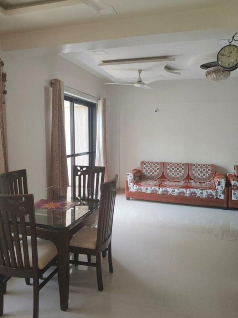 Living Room, naren-bliss-phase-i 2 Bedroom 850 Sq.Ft. Apartment In Magarpatta Road Pune 10415510