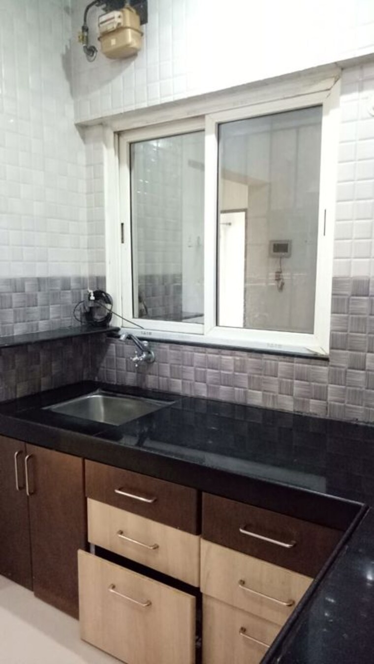 Kitchen, essen-aishwaryam-comfort-phase-i 2 Bedroom 890 Sq.Ft. Apartment In Akurdi Pune 10415572