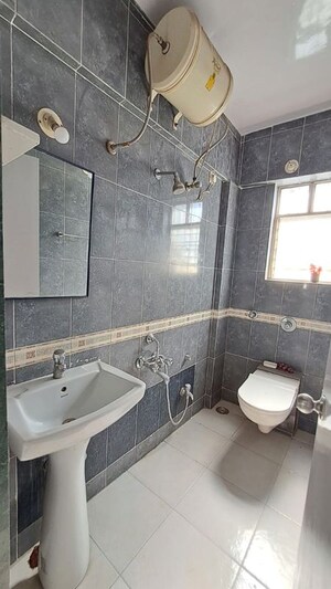Bathroom in 3 BHK Apartment at Madhukund Apartment, Bavdhan – for Rent