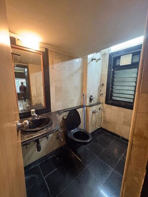 Bathroom in 3 BHK Apartment at Aditya Apartment, Andheri West – for Rent