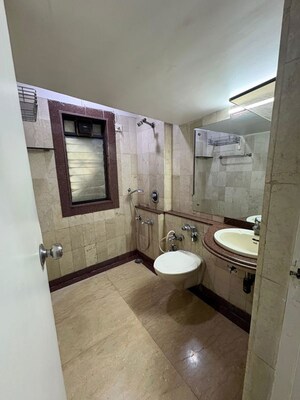 Bathroom in 3 BHK Apartment at Aditya Apartment, Andheri West – for Rent