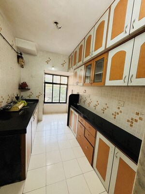 Kitchen in 1 BHK Apartment at Seth Cypress  CHS, Mulund West – for Rent