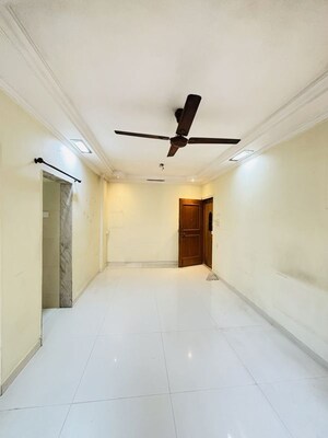 Living Room in 1 BHK Apartment at Seth Cypress  CHS, Mulund West – for Rent
