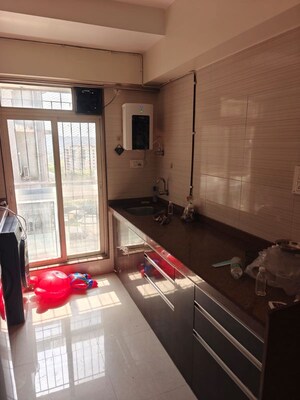Kitchen in 3 BHK Apartment at Satellite Tower, Goregaon East – for Rent