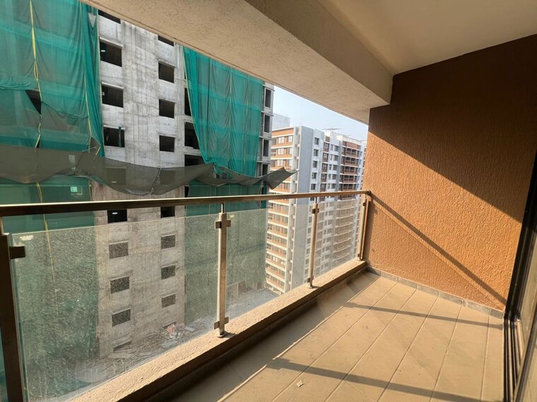 Kitchen, unique-youtopia 3 Bedroom 1060 Sq.Ft. Apartment In Kharadi Pune 10415670