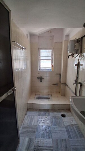 Bathroom in 2 BHK Apartment at Raheja Township, Malad East – for Rent
