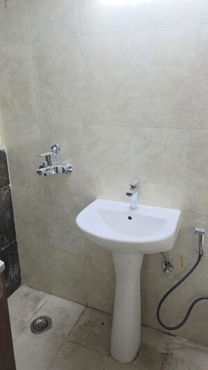Bathroom in 3.5 BHK Apartment at Apex Quebec, Siddharth Vihar – for Sale