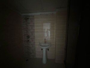 Bathroom in 3 BHK Apartment at Amrapali Zodiac, Sector 120 – for Sale
