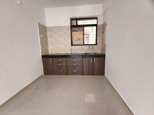 Kitchen in 2 BHK Apartment at Kolte Patil Margosa Heights, Mohammadwadi – for Rent
