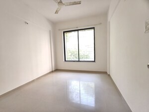 Room in 2 BHK Apartment at Kolte Patil Margosa Heights, Mohammadwadi – for Rent