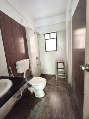 Bathroom in 2 BHK Apartment at Kolte Patil Margosa Heights, Mohammadwadi – for Rent