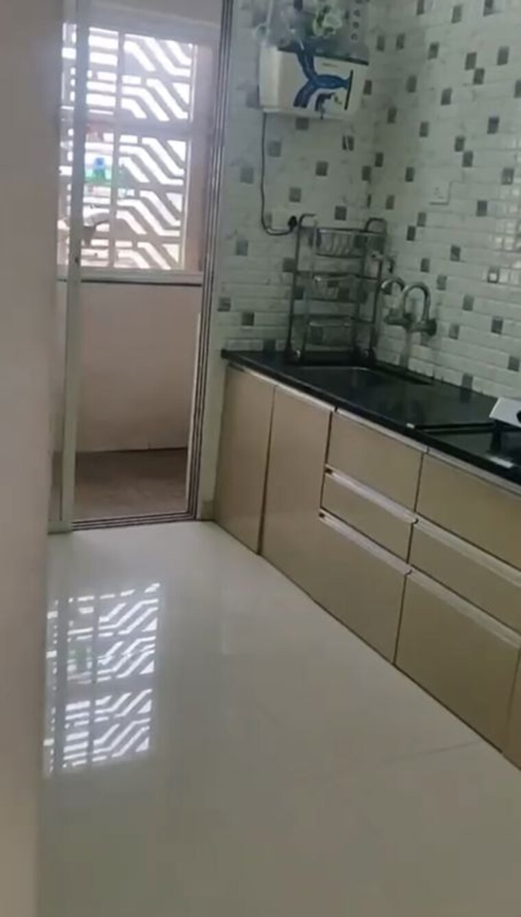 Kitchen, remonesa-the-vue 2 Bedroom 1050 Sq.Ft. Apartment In Kondhwa Pune 10415796