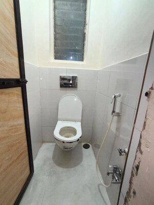 Bathroom in 1 BHK Apartment at Shalmali Cooperative Housing Society, Vasant Vihar – for Rent