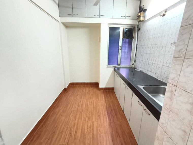 Kitchen, shalmali-cooperative-housing-society 1 Bedroom 508 Sq.Ft. Apartment In Vasant Vihar Thane 10415864