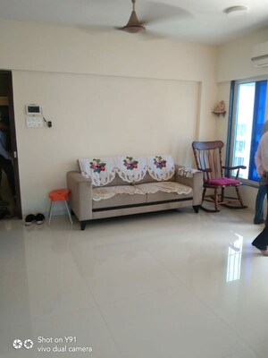 Living Room in 1 BHK Apartment at Gsa Grandeur, Malad East – for Rent