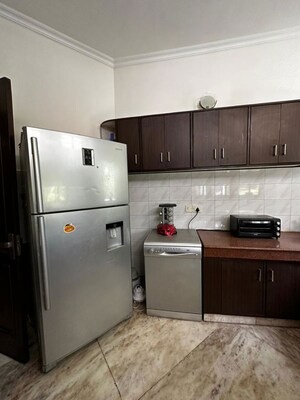 Kitchen in 4 BHK Builder Floor at Dlf Phase I – for Rent