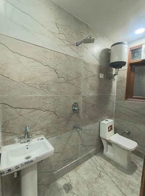 Bathroom in 2 BHK Builder Floor at Govindpuri – for Rent