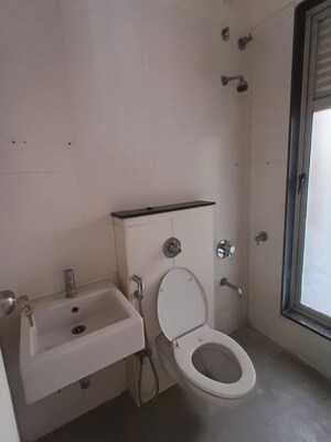 Bathroom in 1.5 BHK Apartment at Sheth Fiona, Pokhran Road No Two – for Rent