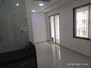 Building Lobby in 2 BHK Apartment at Nirman Milestone, Ravet – for Rent