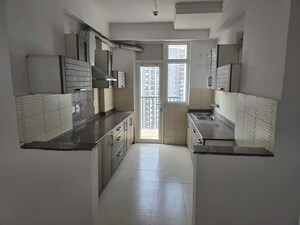 Kitchen in 3 BHK Apartment at Amrapali Platinum, Sector 119 – for Sale
