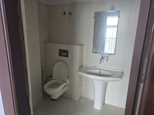Bathroom in 3 BHK Apartment at Amrapali Platinum, Sector 119 – for Sale