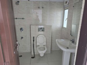 Bathroom in 3 BHK Apartment at Amrapali Platinum, Sector 119 – for Sale