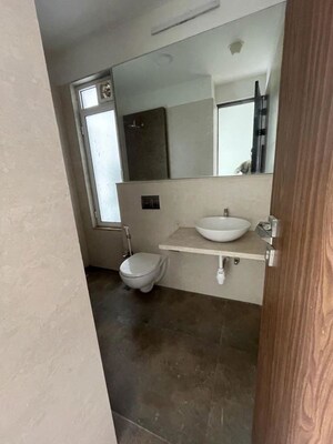 Bathroom in 3 BHK Apartment at Omkar Alta Monte, Malad East – for Rent