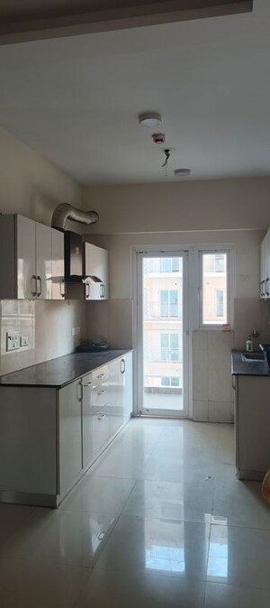 Kitchen in 3 BHK Apartment at Samridhi Luxuriya Avenue, Sector 150 – for Rent