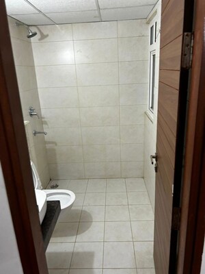 Bathroom in 3 BHK Apartment at Samridhi Luxuriya Avenue, Sector 150 – for Rent