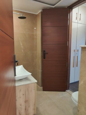 Bathroom in 3.5 BHK Builder Floor at Sushant Lok I – for Rent
