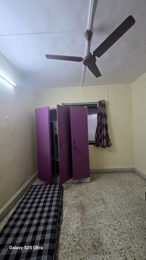 Bedroom in 2 BHK Apartment at Krishnalaya CHS, Vrindavan Society – for Sale