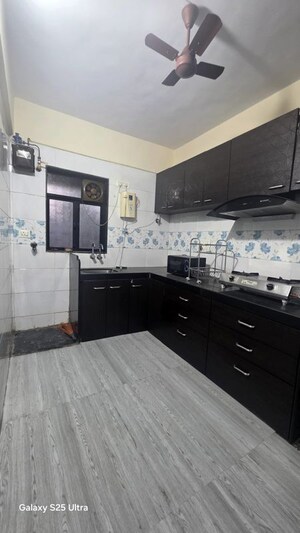 Kitchen in 2 BHK Apartment at Krishnalaya CHS, Vrindavan Society – for Sale
