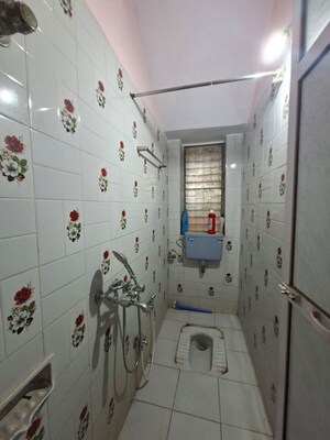 Bathroom in 2 BHK Apartment at Raj Castle CHS, Borivali West – for Rent