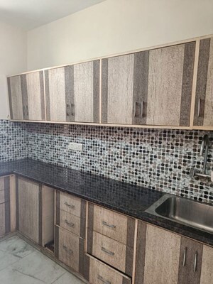 Kitchen in 2 BHK Builder Floor at Khirki Extension – for Rent
