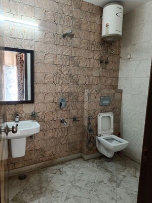 Bathroom in 2 BHK Builder Floor at Khirki Extension – for Rent