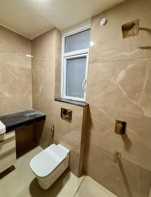 Bathroom in 3 BHK Apartment at Smart World Orchard, Sector 61 – for Rent