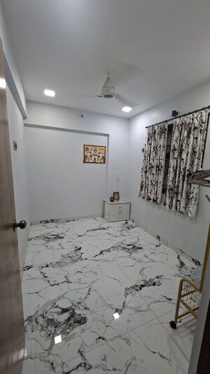 Bedroom in 4 BHK Apartment at C Teja Kaavya Beachwood CHS, Kandivali West – for Rent