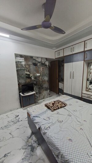 Bedroom in 4 BHK Apartment at C Teja Kaavya Beachwood CHS, Kandivali West – for Sale