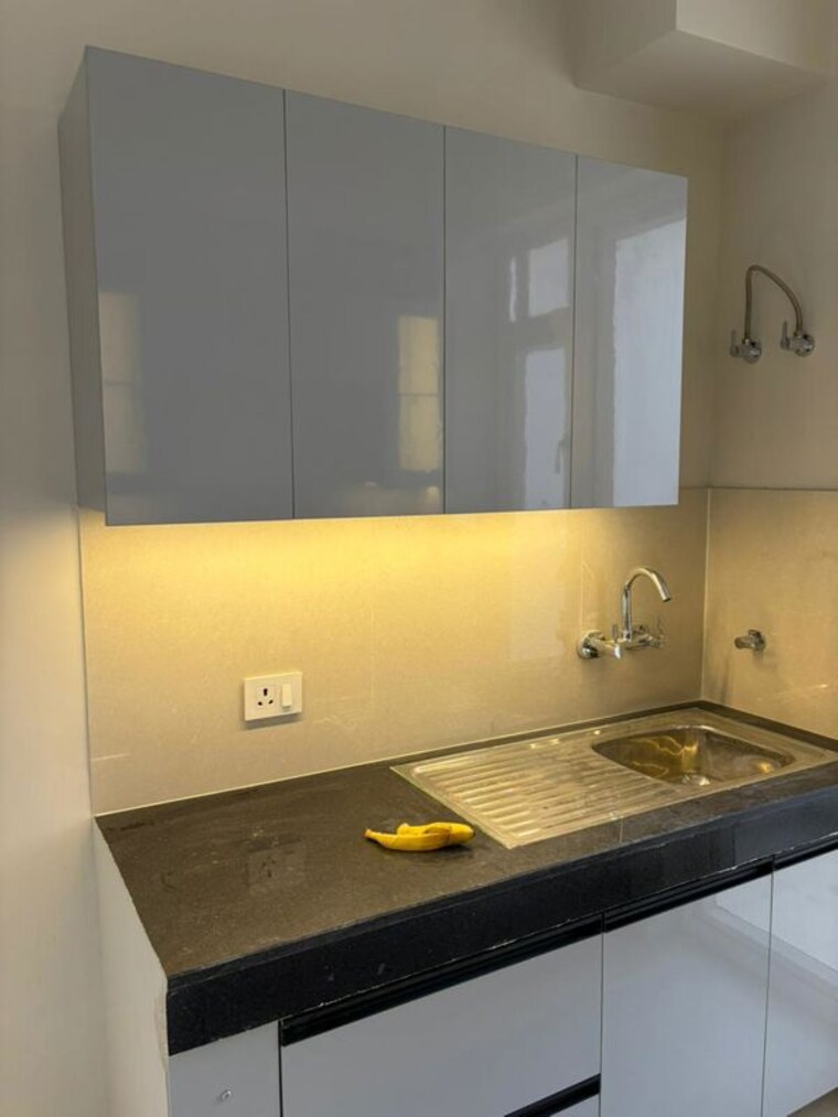 Kitchen, eldeco-live-by-the-greens 2 Bedroom 1137 Sq.Ft. Apartment In Sector 150 Noida 10414092