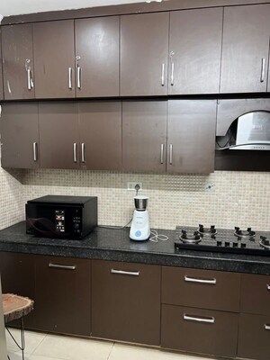 Kitchen in 2 BHK Apartment at Omega Green Park, Faizabad Road – for Rent