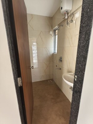 Bathroom in 1 BHK Apartment at Raunak Bliss, Ghodbunder Road – for Rent