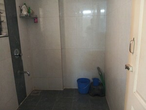 Bathroom in 1.5 BHK Apartment at Shree Satya Shankar Residency, Manpada – for Sale