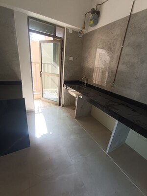 Kitchen in 2 BHK Apartment at Sheth Auris Bliss, Malad West – for Rent