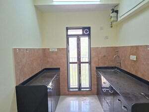 Kitchen in 2 BHK Apartment at Avkar Happy Homes CHS Ltd, Borivali West – for Rent