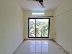 Room in 2 BHK Apartment at Avkar Happy Homes CHS Ltd, Borivali West – for Rent