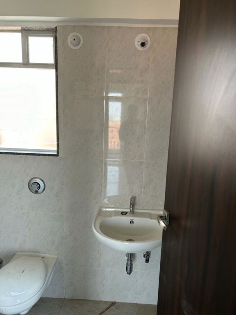 Bathroom, puraniks-aldea-espanola-phase-7 2 Bedroom 1200 Sq.Ft. Apartment In Baner Pune 10416716