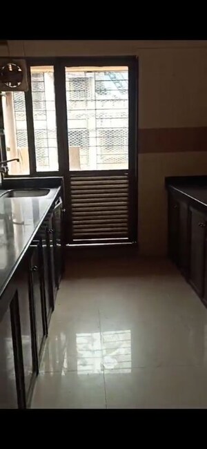 Kitchen in 2 BHK Apartment at Mayfair Housing Mayfair Marvel, Malad West – for Rent